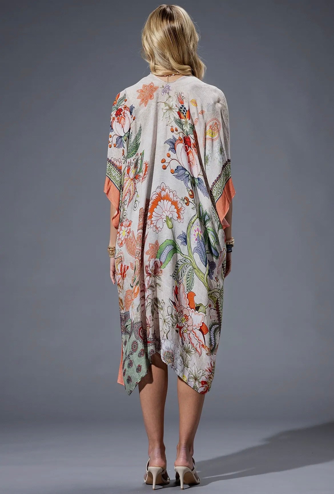 Full back view of the Sienna Kimono with vibrant floral and paisley pattern.