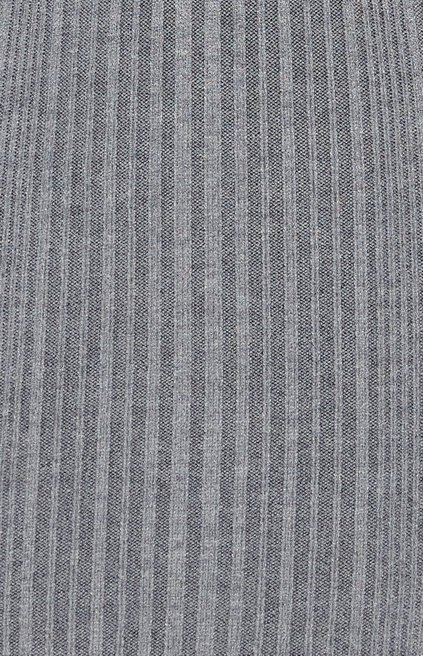 Woman wearing a long sleeve grey ribbed knit bodycon midi dress with a side slit and scoop neckline, styled with black heels rib close up