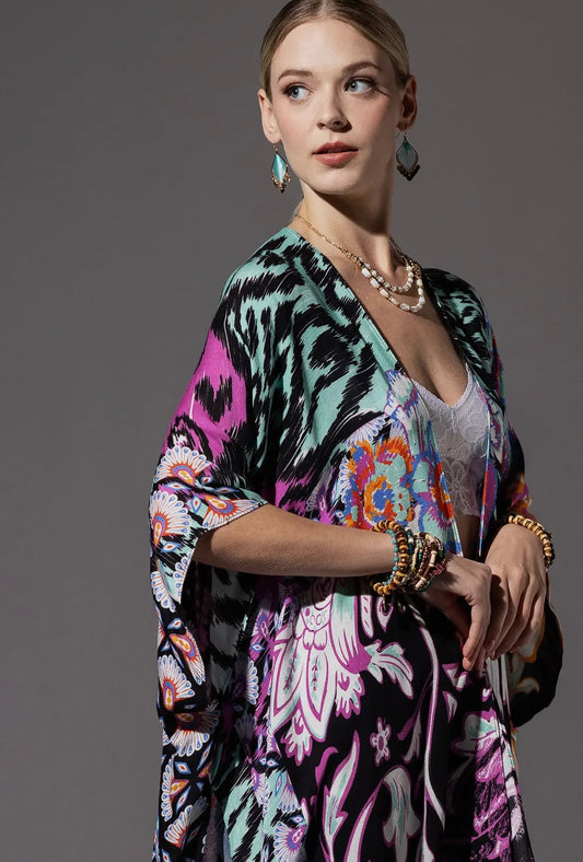 Close-up of Mana Kimono – women’s bold boho kimono with colourful floral and tribal print