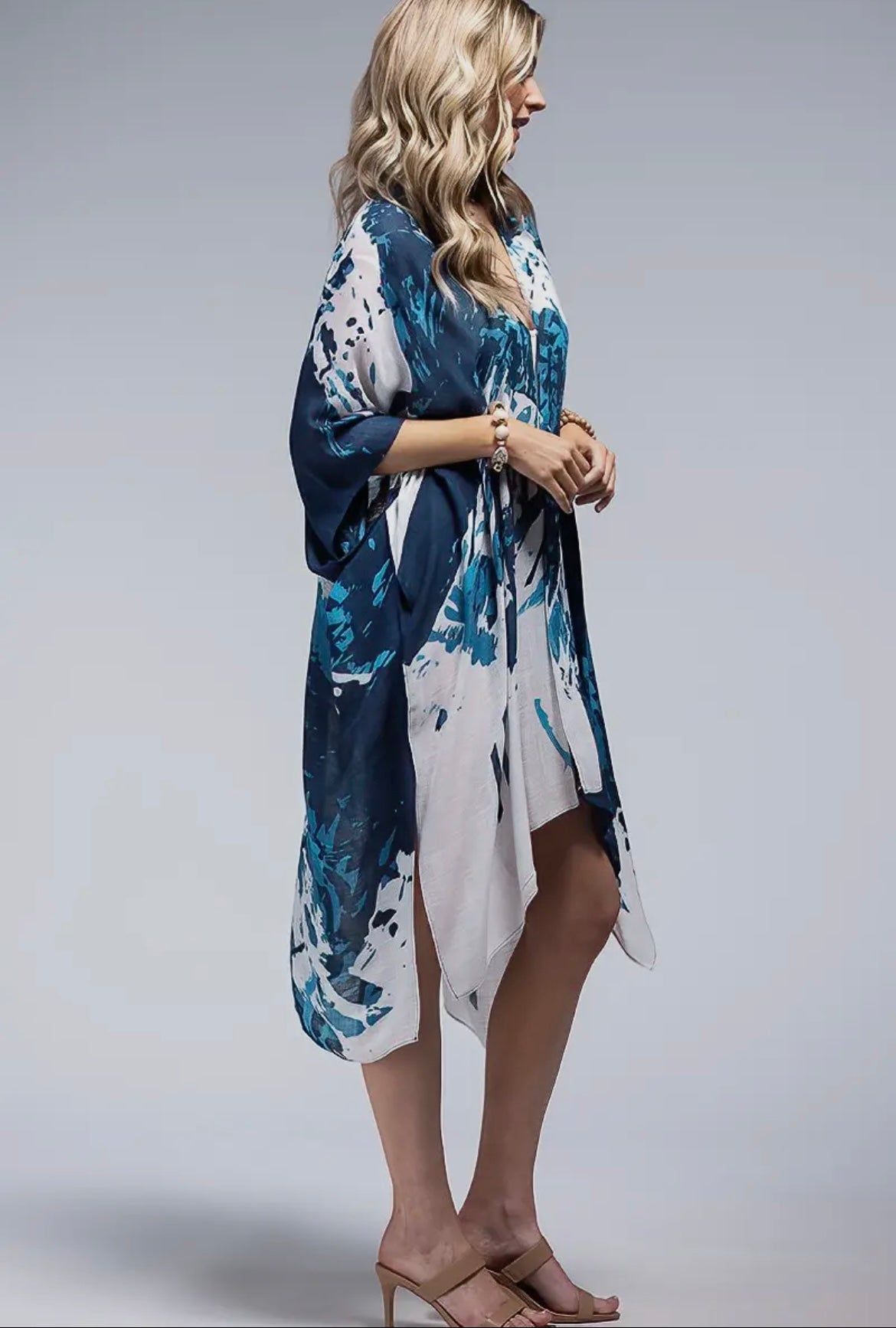 Side angle of Emma Kimono showing soft drape and abstract splash print – boho beach cover-up