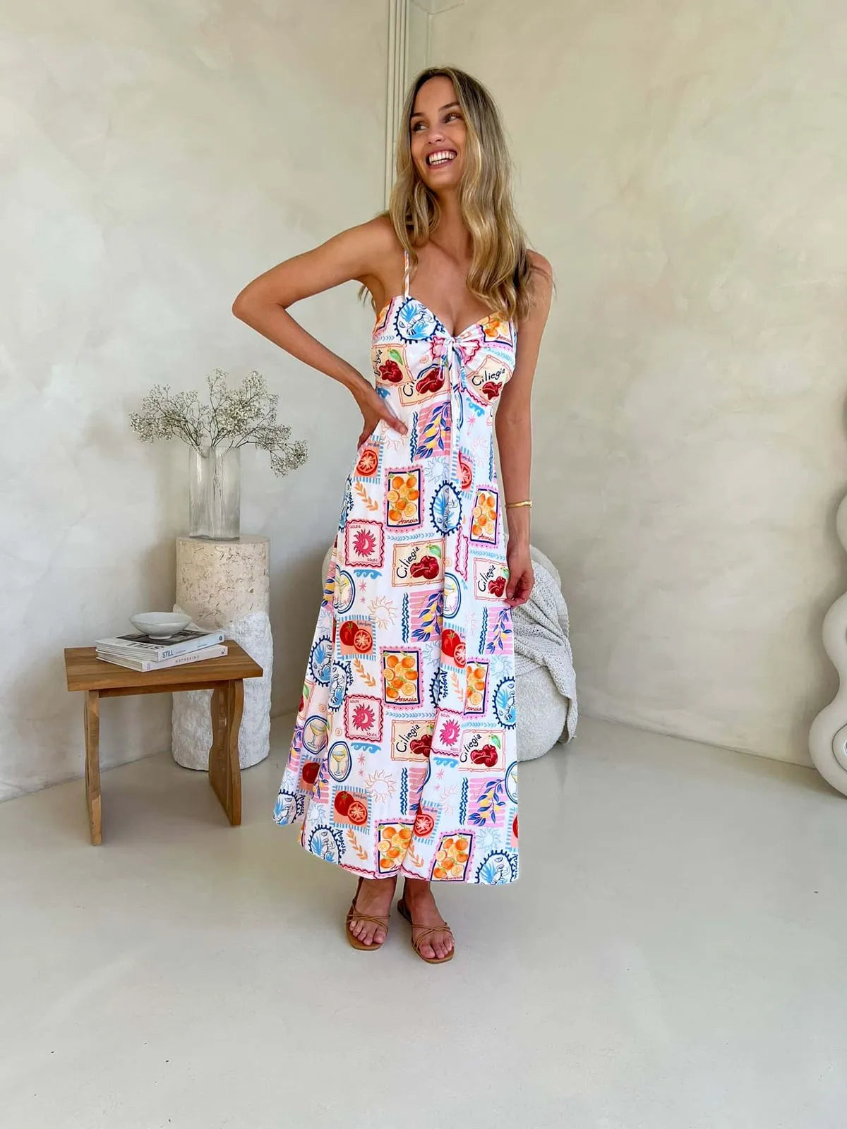 Cameo Dress – boho-style summer midi dress with graphic tile print, tie-front bust and lined design for women’s casual wear.